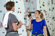 © auremar - climbers having a drink by indoor wall