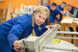 © auremar - portrait of young lady in carpentry workshop