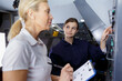 © auremar - aero engineer and apprentice working on in hangar