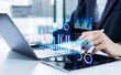 © Father_Studio - Businessman analyzing enterprise data management with business analytics dashboard, charts, metrics and KPIs for performance monitoring, strategic planning and data driven decisions.