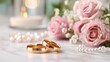 © lililia - A flat lay shows two gold wedding rings surrounded by pink roses and pearls on white, forming a scene for love and unity