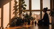© indika055 - Young person silhouette sitting peacefully near a large window with indoor plants, sunlight beams entering room, calm atmosphere, meditation and mental wellness concept, warm tones, lifestyle