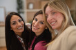 © Dexon Dee - Diverse women friends smiling together enjoying female bonding