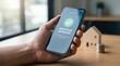 © Maxime - Person Holding Smartphone With Mortgage Loan Approval Notification On Screen In Modern Office
