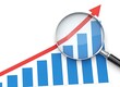 © Jim - Magnifying glass highlighting business growth chart with upward trend and detailed analysis for financial success and investment insights,*Business Analytics & Financial Growth
