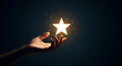 © Muhammad - Hand reaching out to touch a bright glowing star with light particles on dark background concept of achieving goals motivation and inspiration