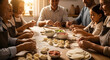 © pjdesign - Children parents and grandparents sitting together in a bright kitchen preparing traditional dough snacks with meat and vegetable fillings