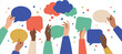 © sofikul - A colorful illustration of diverse hands holding speech bubbles in a vibrant and lively atmosphere