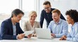 © SimpleLife Stock - Diverse business team discussing documents and laptop during a professional office meeting, showing collaboration, teamwork and corporate planning in a modern workplace environment.