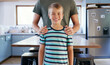 © peopleimages.com - Family, portrait and smile of boy in kitchen with father for bonding, relationship or security. Love, support and trust of single parent man with son in home for affection, development or growth