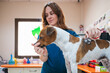 © Gonzalo Infiesta - Veterinarian examining dog with a stethoscope in clinic