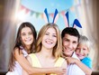© BillionPhotos.com - Happy family in bunny ears, Easter concept