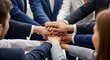 © Sumaiya - A Group of People Joining Hands Together in a Show of Unity and Teamwork