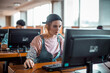 © Marko Geber - Focused student using desktop computer in university lab