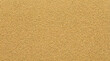 © SeHarmza :) - A full frame close-up shot of very fine-grained golden sand showcasing its uniform texture and warm, inviting color under natural light conditions.