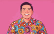 © hakule - A young man stands smiling while wearing a bright floral shirt against a pink background. He displays a friendly expression.