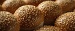 © The 2R Artificiality - Close up photo of sesame seed topped sandwich buns stack