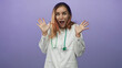 © Krakenimages.com - Young woman doctor in white labcoat with stethoscope, hands raised and open mouth showing surprise in studio; surprise playfulness.