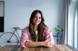 © Daniel - Happy pretty millennial girl home head shot portrait. Young confident business woman in casual, entrepreneur, blogger posing at home office workplace table enjoying indoor, smiling at camera