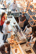 © Rawpixel.com - Bustling cafe with diverse patrons.