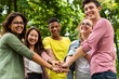 © Rawpixel.com - Diverse friends united outdoors.