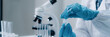 © mojo_cp - Scientists perform biochemical experiments in a lab for health care solutions
