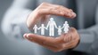 © pier - family protection concept with hand icon insurance planning and financial security