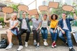 © Rawpixel.com - Diverse group holding speech bubbles.