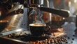 © Asom - A steaming cup of coffee being poured from an espresso machine