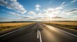 © Chandara - A long, straight road with a clear horizon, featuring a single white car driving away from the viewer, leaving a shadow on the asphalt, and a bright, sunny sky with scattered clouds.