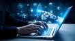 © ShahabudinKhan - A person types on a laptop computer with a futuristic robotic hand reaching from the screen to interact with a glowing blue digital display of artific