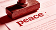 © oeisdesign - Wooden Rubber Stamp Pressing Peace Word On Official White Paper