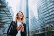 © Innavector - Confident businesswoman using smartphone outside modern glass office buildings in the city.
