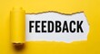 © thenort - Yellow torn paper revealing 'FEEDBACK' text. Shows concept of communication and evaluation