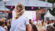 © Довидович Михаил - Little girl enjoying latin american festival with crowd watching live music concert