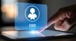 © rayzo - Hand touching a holographic CEO icon on a digital tablet, representing leadership and executive roles.