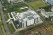 © AmazingAerialAgency - Aerial view of large ai data center property with rooftop cooling systems providing information technology, network, and cloud services, Jakarta, Indonesia.