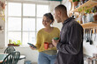 © ReeldealHD images - Couple Sharing a Moment with Coffee in Kitchen