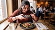 © edojob - Woman capturing restaurant food image for social media