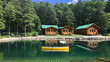 © Lauren - Camp evergreen lakeside cabins and canoes for summer vacation rentals travel