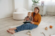 © standret - Happy mother with her baby daughter are at home together