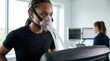 © Yauhen - A sweaty athlete wearing a mask runs on a treadmill during a VO2 max test. This image conveys health assessment, scientific research, and athletic performance. Ideal for fitness content.