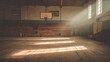 © SCHRÖDER - Wide view of an abandoned vintage basketball gymnasium with dusty sunbeams streaming through tall windows onto a worn wooden floor