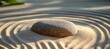 © Andrei - A serene Zen garden with smooth stones on raked sand, inviting calm and peaceful meditation.