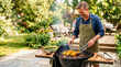 © Xenia - Man grilling corn on the cob on a kettle grill in a sunny backyard. Summer outdoor cooking and healthy food concept. Man in apron preparing vegetables for a barbecue party