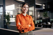 © Stock 4 You - Portrait of beautiful successful hispanic young business woman with crossed arms smiling at camera. Latin or eastern confident middle age female ceo leader businesswoman standing in office. Copy space