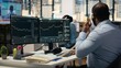 © DC Studio - Worried portfolio managers making telephone calls in response to Black Swan event disruption. Panicked prop firm workers evaluate stock market impact of unexpected recession