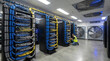 © siti faqihah haslu - Technician managing organized cables and server racks in a modern data center environment