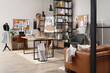 © Pixel-Shot - Interior of fashion designer's studio with tables, pin boards and shelf unit