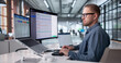 © Andrey Popov - Young Professional Managing Cloud-Based ERP Software On Laptop
